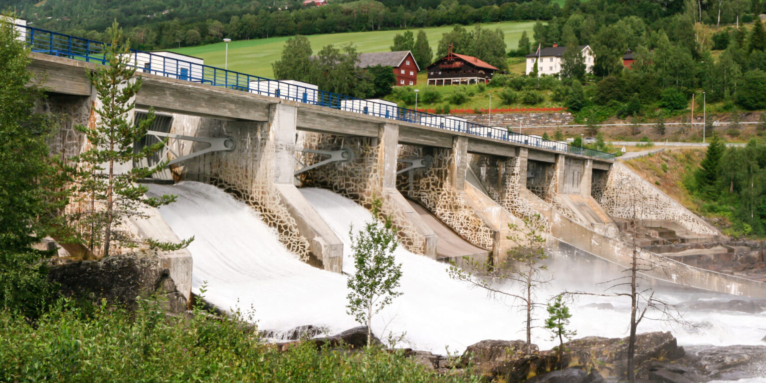 Huge amounts of water flowing in the river near the Hunderfossen hydroelectric power station in Norway.